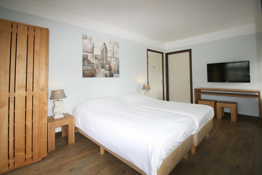 אוסטקאפלה Strandhotel Dennenbos מראה חיצוני תמונה