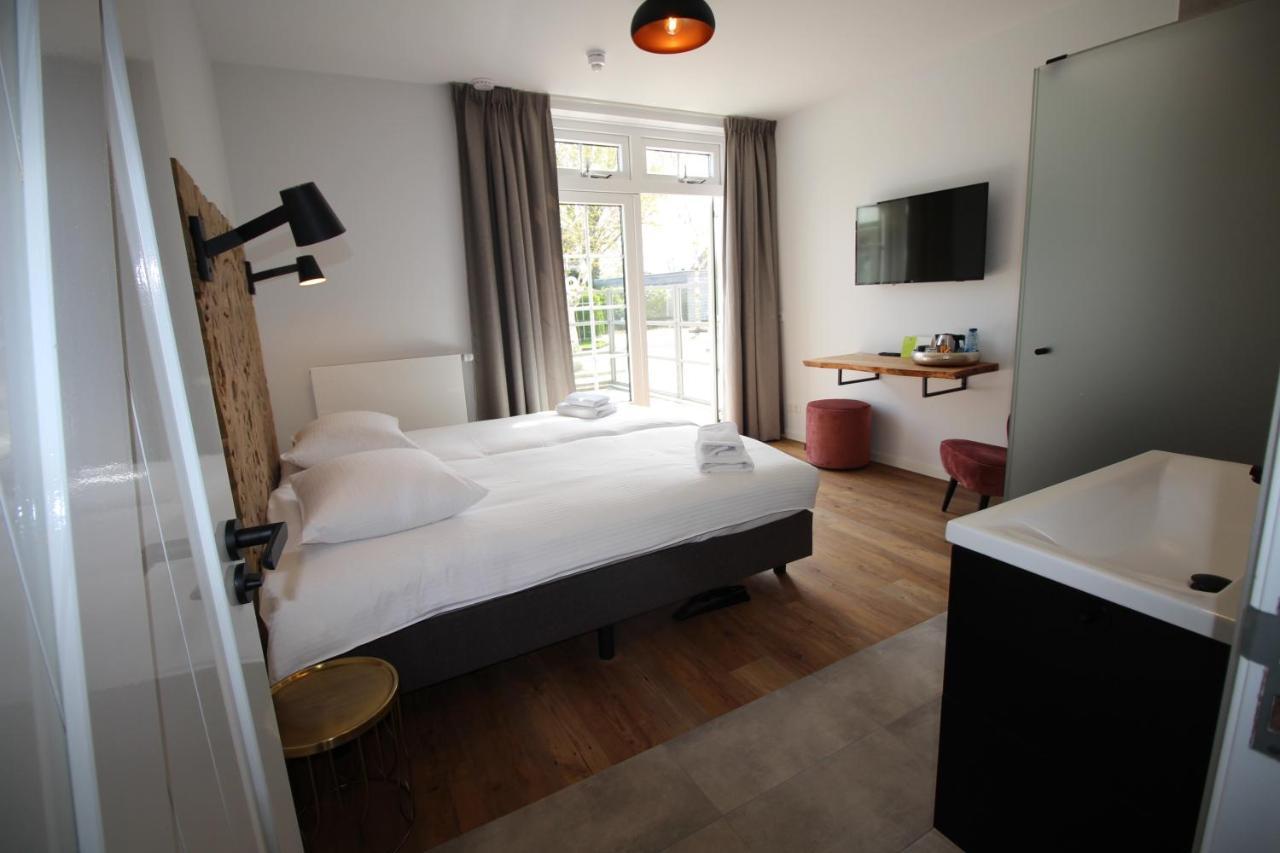 אוסטקאפלה Strandhotel Dennenbos מראה חיצוני תמונה